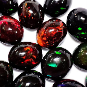 Calidad de exportación 100% ópalo de fuego etíope natural Welo cabujón corte ovalado fabricación de joyas piedras preciosas llamativas múltiples a los precios más bajos OEM - Product Image 1