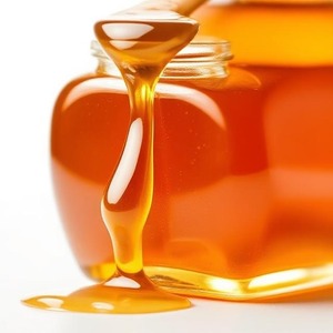 Miel d'abeille frais de fabrication indienne, miel doré sucré pour les aliments santé et les boissons naturelles, disponible à la vente - Product Image 4