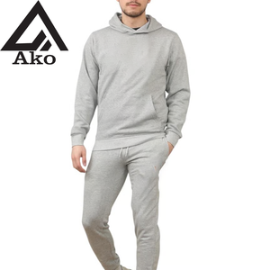 Ensemble sweat-shirt et jogging gris clair sportif, look tendance, essentiel au quotidien, parfait pour les tenues décontractées, toutes saisons, confort et style par Ako - Product Image 1
