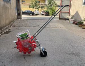 Vật liệu mới tay đẩy Ngô seeder 1 hàng seeding và bón phân tất cả trong một máy - Product Image 3