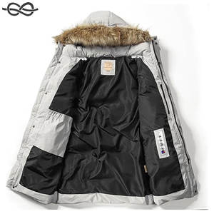 Chaqueta Parka cálida con capucha de invierno de longitud media para hombre con ribete de piel sintética extraíble Abrigo de hombre elegante y duradero para clima frío - Product Image 2