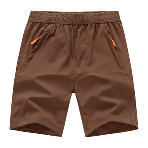 Pantalones cortos elásticos Cargo personalizados con múltiples bolsillos para hombre, alta tendencia, 100% poliéster, patrón sólido, cintura media, calidad superior - Product Image 1