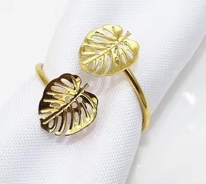 Le rond de serviette glamour en feuille d'or avec un design d'arc artistique améliore la table à manger avec un style sophistiqué et brillant - Product Image 3