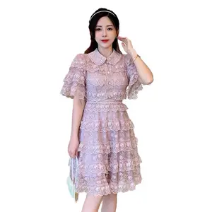 Lace short-sleeved dress trend for summer 2023 hepburn style a-line combining with multi-layer ruffled skirt creating elegant an