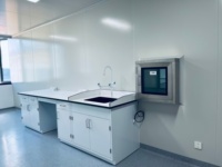 Boîte de transfert dynamique à interverrouillage mécanique pour environnements propres en usine pharmaceutique