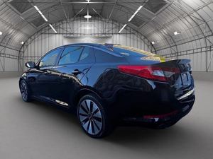 รถยนต์มือสองสภาพดี ปี 2013 รุ่น O-PTIMA SEDAN TRIM SX ขับเคลื่อนล้อหน้า เครื่องยนต์ 274 แรงม้า 2 ลิตร 14 สีภายนอกสีดำอีโบนี เกียร์อัตโนมัติ 6 สปีด พร้อมใช้งาน - Product Image 4