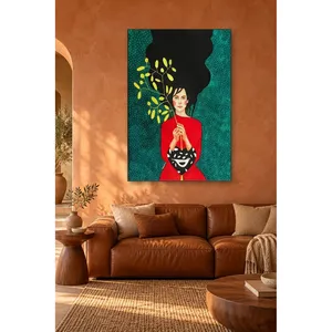 Impression sur toile Fida : Fille en rouge tenant une branche sur fond vert à pois - Product Image 1