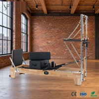 Machine de Pilates Reformer 2-en-1 demi-tourneur en chêne massif de haute qualité et acier inoxydable durable pour usage en studio de Pilates