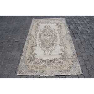 Tapis vintage 3,8x6,46 pieds, tapis turc, tapis en laine gris brun avec motifs de plantes et d'arbres - Product Image 1
