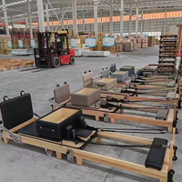 Machine de Pilates Reformer pliable en chêne de qualité supérieure, conforme aux normes britanniques, pour usage commercial, MOQ fabricant