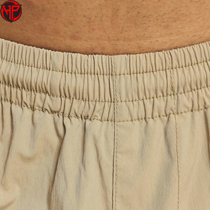 Ensemble coupe-vent tissé décontracté passepoil blanc personnalisé OEM Survêtement uni en nylon pour hommes Logo personnalisé pour adultes avec cordon de serrage pour hommes - Product Image 5