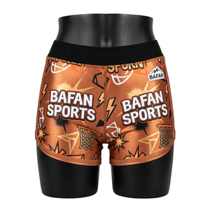 Shorts de mujer premium con paneles gráficos naranjas, tela elástica de poliéster y spandex de 220 GSM, shorts con logo personalizado. - Product Image 1