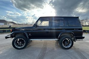 รถ SUV ขับเคลื่อน 4 ล้อ รุ่น HZJ77 ปี 1995 ขายดีที่สุด พวงมาลัยซ้าย เครื่องยนต์ดีเซล เกียร์ธรรมดา พร้อมส่งออก รถออฟโรดที่เชื่อถือได้ - Product Image 2