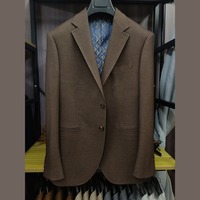 Costume homme marron chocolat, simple boutonnage, deux boutons, revers cranté, poches à rabat, doublure géométrique, costumes d'affaires pour homme, sur mesure MTM