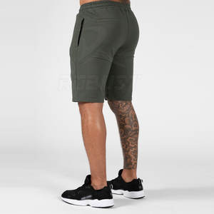 2024 hommes Shorts de gymnastique personnalisé haute rue Style solide motif non tissé tissage décontracté et à la mode entraînement vêtements de course - Product Image 4