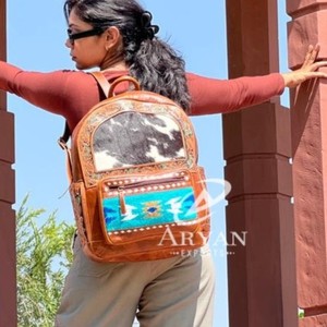 Sacs à dos en cuir de vachette véritable usiné à la main Sacs à dos en cuir sculptés élégants Sacs à dos de style occidental Nouvelle mode élégante - Product Image 1