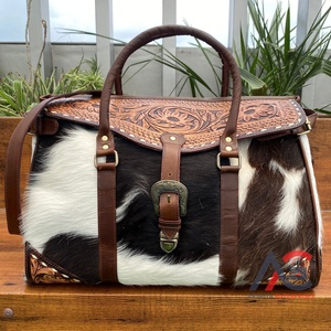 กระเป๋าดัฟเฟิลสำหรับเดินทางกลางแจ้งกระเป๋าหนังวัวแท้สำหรับใช้ได้ทั้งชายและหญิงดีไซน์ลายดอกไม้แฟชั่นหนังวัวแท้โลโก้ได้ตามต้องการ - Product Image 1