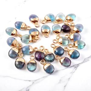 Venta al por mayor de piedras preciosas de fluorita semipreciosas ovaladas facetadas dijes colgantes de oro galvanizados dijes de piedras preciosas para la fabricación de joyas - Product Image 1