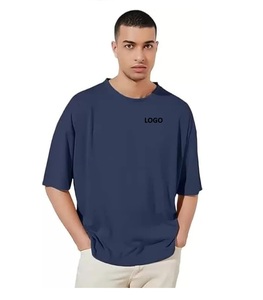 Camiseta formal de algodón/poliéster con logotipo personalizado al por mayor para hombres y mujeres unisex de lona de 300g/m2 con cuello redondo y hombros caídos - Product Image 1
