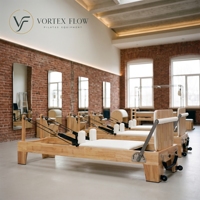 Vente en gros de Reformers Pilates avec structure en chêne massif et bois d'érable, machine Pilates écologique pour clubs de fitness et studios