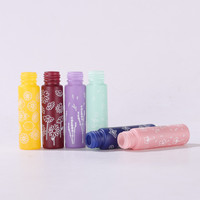 Vente en gros de flacons compte-gouttes en verre imprimés macaron de 10 ml, pour huile essentielle, sérum, conteneur portable rechargeable pour les voyages