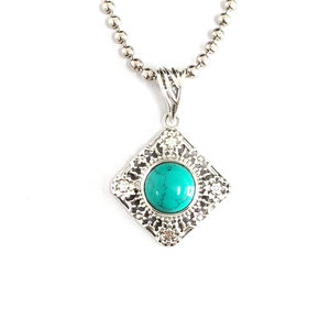Pendentif turquoise en forme de fleur, 3,6 grammes, serti clos - Product Image 1