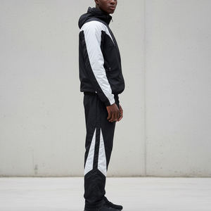 Venta al por mayor de chándal cortavientos impermeable con logotipo bordado personalizado estilo Hip Hop chándal con paneles de bloque de color para hombres - Product Image 2