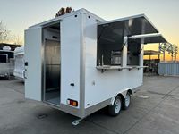Chariot alimentaire avec réfrigérateur intégré et étagère de présentation pour la vente de boissons fraîches et d'aliments emballés