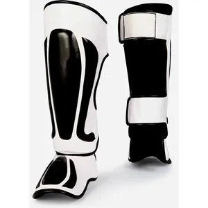 Protège-tibia en cuir véritable Kick Boxing Taekwondo MMA Muay Thai-Protection d'entraînement professionnelle personnalisée de haute qualité Vente en gros - Product Image 3