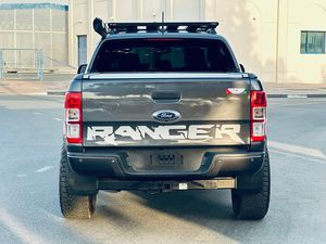 ฟอร์ด เรนเจอร์ ปี 2021 มือสอง เครื่องยนต์เทอร์โบ พวงมาลัยขวา ภายในสีอ่อน-เข้ม เกียร์ธรรมดา ล้อแม็ก R18 ระบบควบคุมความเร็วอัตโนมัติ ใช้เชื้อเพลิงเบนซิน/ไฟฟ้า พวงมาลัยซ้าย - Product Image 2