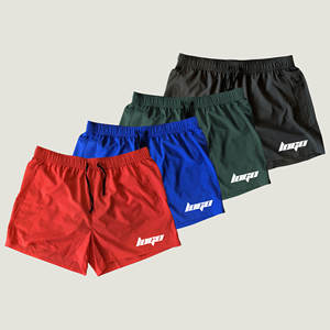 Bolsillos de poliéster de estilo callejero sólido con logotipo personalizado cintura elástica DryFit dobladillo dividido transpirable entrenamiento gimnasio deportes - Product Image 6