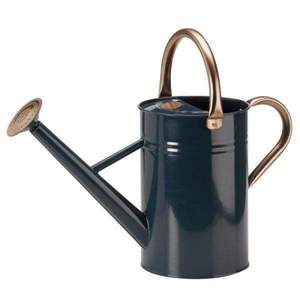 Encanto rústico Diseño de metal El agua puede servir como una pieza de declaración rústica en su jardín que combina forma y función - Product Image 4
