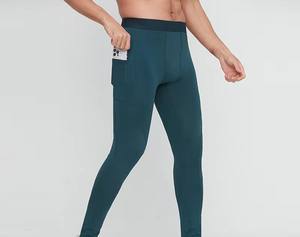 Collants d'entraînement de gymnastique à haute élasticité pour hommes Compression Running Basketball Workout Pants Solid Pattern Elastic Waist Skinny Knitted - Product Image 5