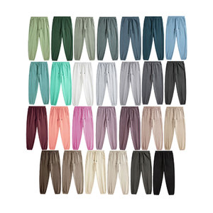 กางเกงวอร์มผู้ชายสีขาวผ้าไนลอนโพลีเอสเตอร์ระบายอากาศสำหรับใส่ออกกำลังกายในฤดูใบไม้ร่วง - Product Image 1