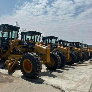 Vente en gros de niveleuses d'occasion Caterpillar 140G 140H 140K Meilleur prix pour le moteur principal de la machine de construction de routes d'origine - Product Image 1