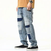 Celana Jeans Pria Desain Khusus Model Longgar Warna Solid Pinggang Tinggi Gaya High Street Kaki Lebar Sobek Terlaris