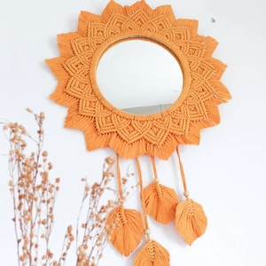 Espejo de pared bohemio recién llegado con marco de macramé y detalles de flecos ligeros diseñados para rincones acogedores - Product Image 1