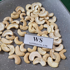 เม็ดมะม่วงหิมพานต์แบบแยกสีขาว Kaju badam มีบริการตามสั่งแนวซันติโกเม็ดมะม่วงหิมพานต์แตก - Product Image 1