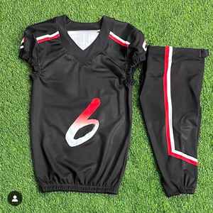 La más alta calidad de diseño personalizado sublimación jóvenes uniformes de fútbol americano aparejos sarga Jersey pantalones integrados - Product Image 1