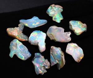 Piedras preciosas de fuego de ópalo etíope pulidas y crudas piedras en bruto de ópalo etíope natural Suelto - Product Image 1