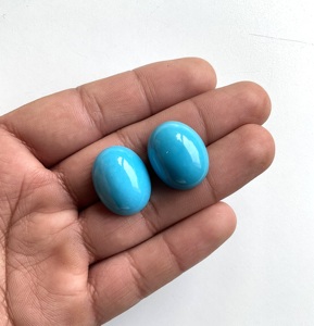 พลอยเทอร์ควอยซ์สีน้ำเงินเปลี่ยนสี 56.12 กะรัต ทรงคาโบชอง 2 ชิ้น คู่ สำหรับทำเครื่องประดับชั้นดี - Product Image 4