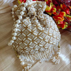 2025 @ <b>White</b> Potli <b>Bags</b> on Silk Fabric with Heavy Embellished Pearls, Crystal Glass Beads Sequence Work for Party-wear/Wedding - Product Image 1