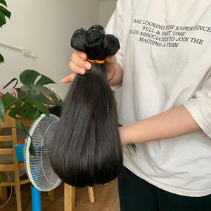 Venta al por mayor Raw vietnamita camboyano Remy extensión del pelo de doble dibujado ondulado natural y recto de doble trama sin enredos mechones de pelo - Product Image 1