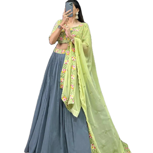Lumineux et brillant avec notre tradition de bordure lourde en tissu Georgette de style culturel gujarati avec notre robe exquise Lehenga Choli - Product Image 1