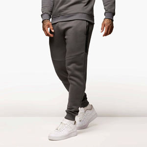 Pantalones deportivos de chándal para hombre, ajustados, de forro polar, con cintura elástica y puños en los tobillos, informales, para entrenamiento deportivo, en gris - Product Image 1