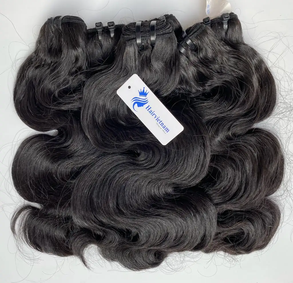 Tendenza a caldo del corpo ondulato capelli in Vietnam produttore professionale tessuto capelli molti texture lunghezza OEM capelli di alta qualità