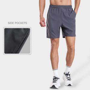 กางเกงขาสั้นลำลองสีพื้นสำหรับผู้ชายกางเกงขาสั้นผ้าโพลีเอสเตอร์แห้งเร็วระบายอากาศความยาวปานกลางไซส์ใหญ่พิเศษส่งของทุกวัน - Product Image 1