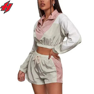 ชุดกีฬากันลมผ้าไนลอนสะท้อนแสงสำหรับผู้หญิงชุดวอร์มกีฬาฤดูใบไม้ผลิ/ฤดูร้อนโลโก้แบบเต็มชุดออกแบบได้ตามต้องการ - Product Image 5