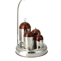 Belle gamme de casseroles arabes en métal avec 3 bols assortis pour conserver les épices, permettant aux cumin, au curcuma et au safran de fleurir magnifiquement