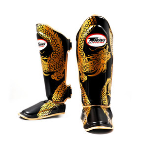 Espinilleras Gemelas de Alta Calidad Hechas de Cuero Genuino con Diseño Personalizado, Logotipo a Color y Correa Ajustable con Cierre de Velcro para Muay Thai - Product Image 2